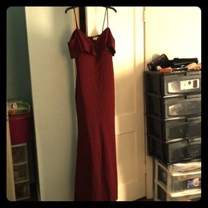 Long of the shoulder burgundy formal gown